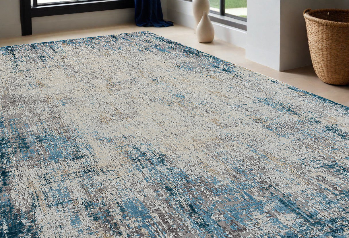 5' x 8' Blue and Ivory Abstract Area Rug