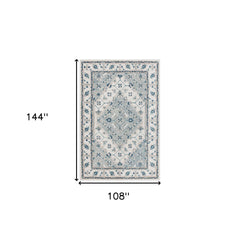 9' x 12' Blue and Ivory Wool Floral Hand Tufted Area Rug