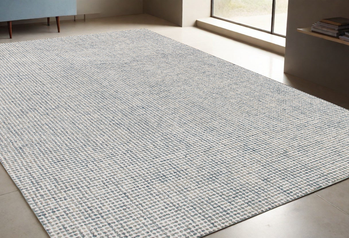 5' x 7' Blue and Ivory Wool Abstract Hand Tufted Area Rug