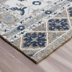 9' x 12' Blue and Ivory Wool Floral Hand Tufted Area Rug