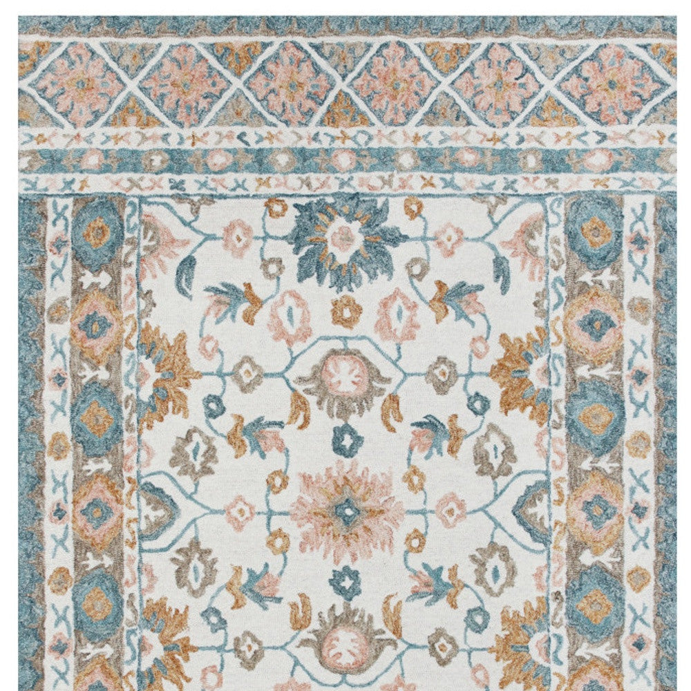 8' x 10' Blue and Ivory Wool Floral Hand Tufted Area Rug