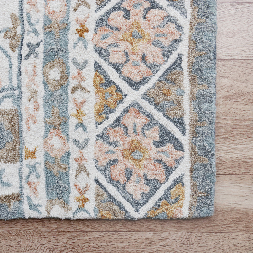 8' x 10' Blue and Ivory Wool Floral Hand Tufted Area Rug