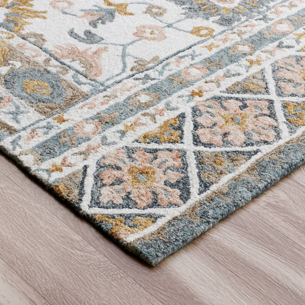 8' x 10' Blue and Ivory Wool Floral Hand Tufted Area Rug