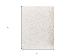 4' x 6' White and Gold Faux Fur Abstract Shag Non Skid Area Rug