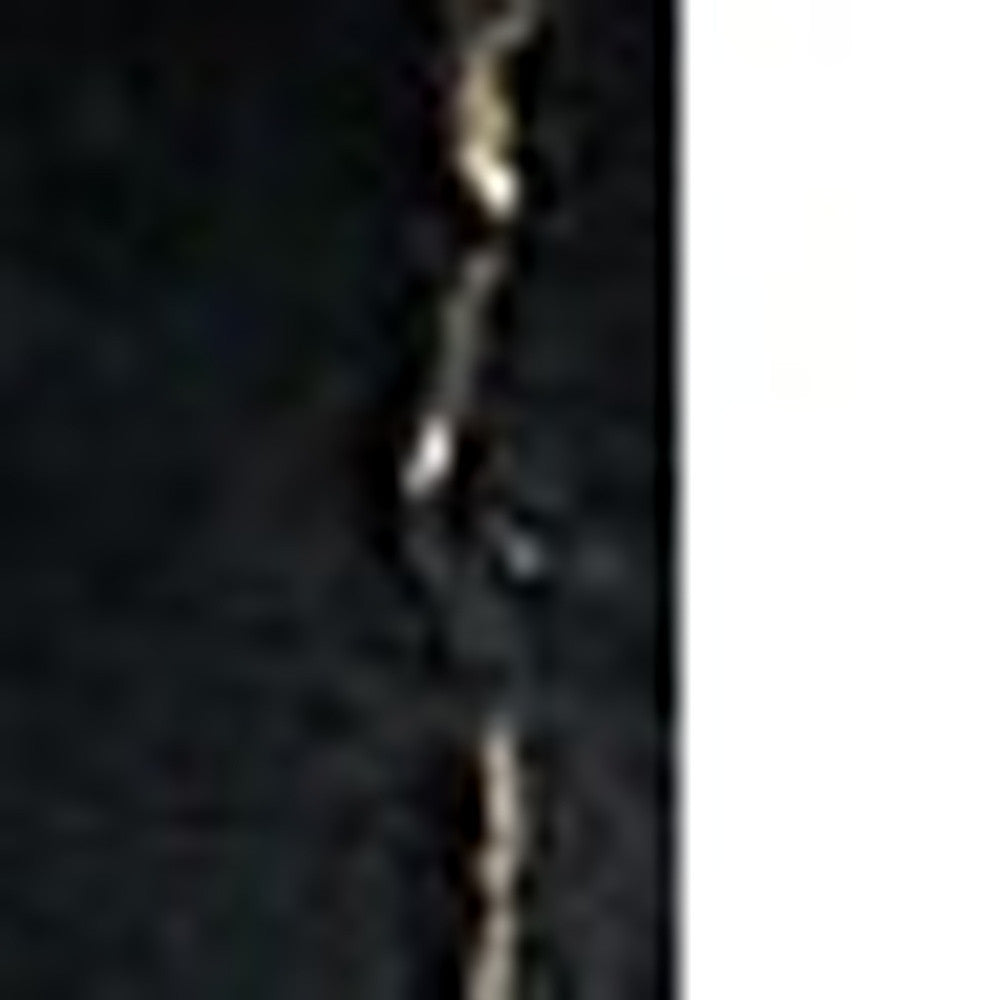 5' x 7' Black and Gold Faux Fur Abstract Shag Non Skid Area Rug