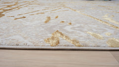 9' x 12' Ivory and Gold Abstract Area Rug