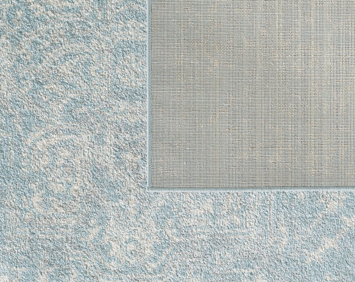 7'X12' Spa Blue Machine Woven Distressed Medallion Indoor Area Rug
