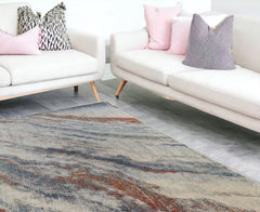 7' x 10' Ivory Blue and Orange Abstract Power Loom Area Rug