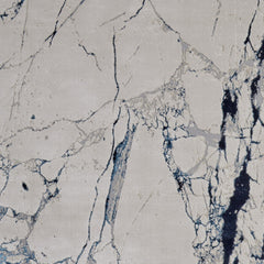 5' x 8' Ivory and Blue Marble Power Loom Distressed Area Rug