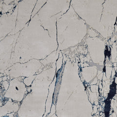 10' x 13' Ivory and Blue Marble Power Loom Distressed Area Rug