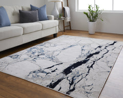 10' x 13' Ivory and Blue Marble Power Loom Distressed Area Rug