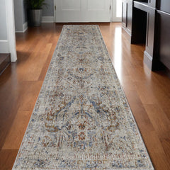 12' Ivory Blue and Orange Medallion Power Loom Distressed Runner Rug With Fringe
