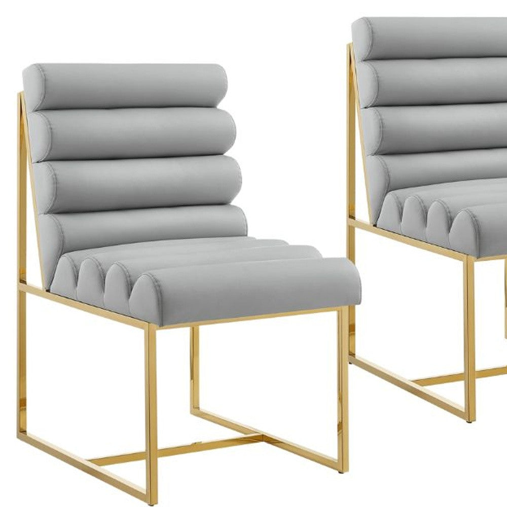 Set of Two Tufted Gray And Gold Upholstered Faux Leather Dining Side Chairs