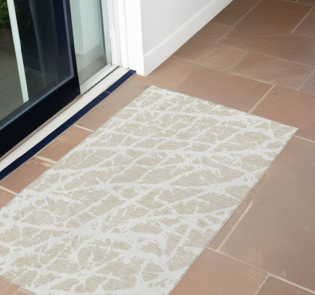3' X 4' Beige and Ivory Abstract Washable Non Skid Indoor Outdoor Area Rug