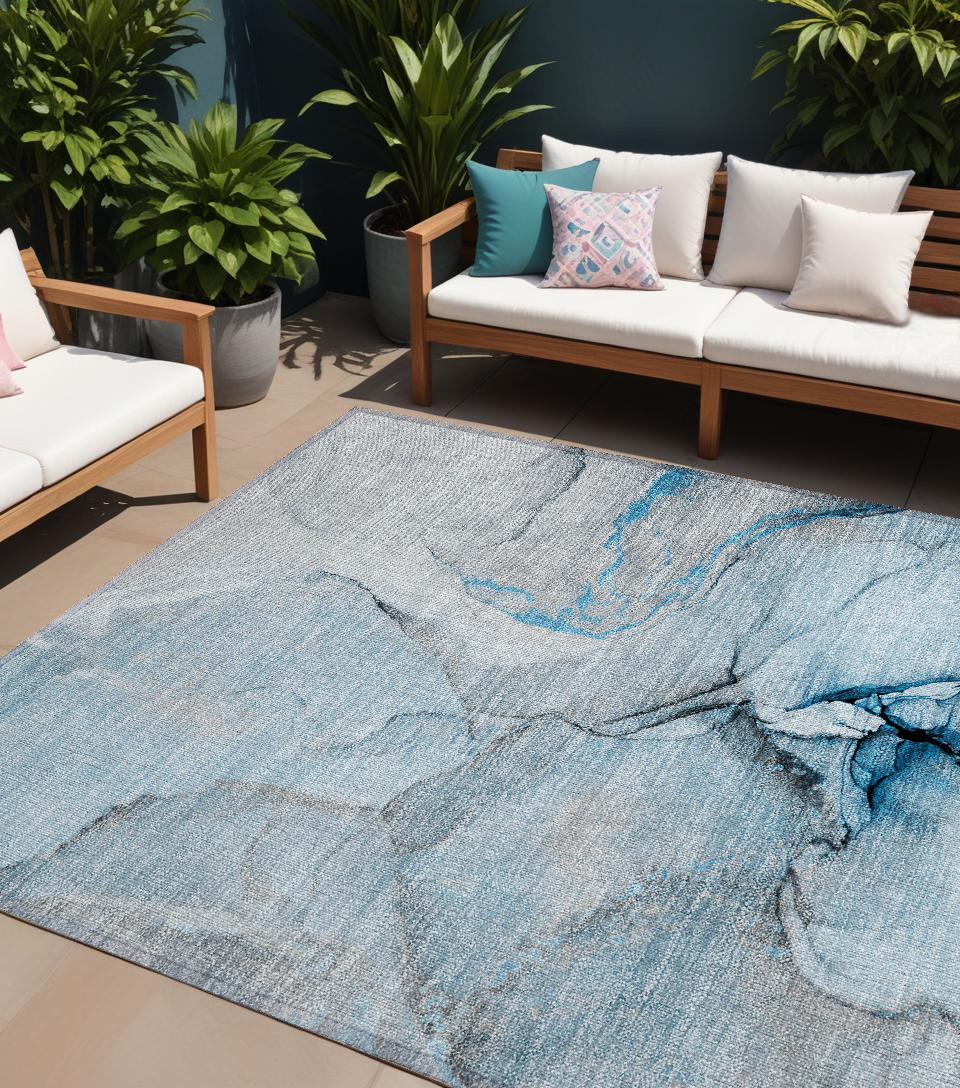 10' X 14' Blue and Ivory Abstract Washable Non Skid Indoor Outdoor Area Rug