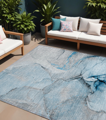 10' X 14' Blue and Ivory Abstract Washable Non Skid Indoor Outdoor Area Rug