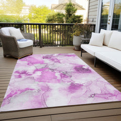 10' X 14' Pink and Ivory Abstract Washable Non Skid Indoor Outdoor Area Rug