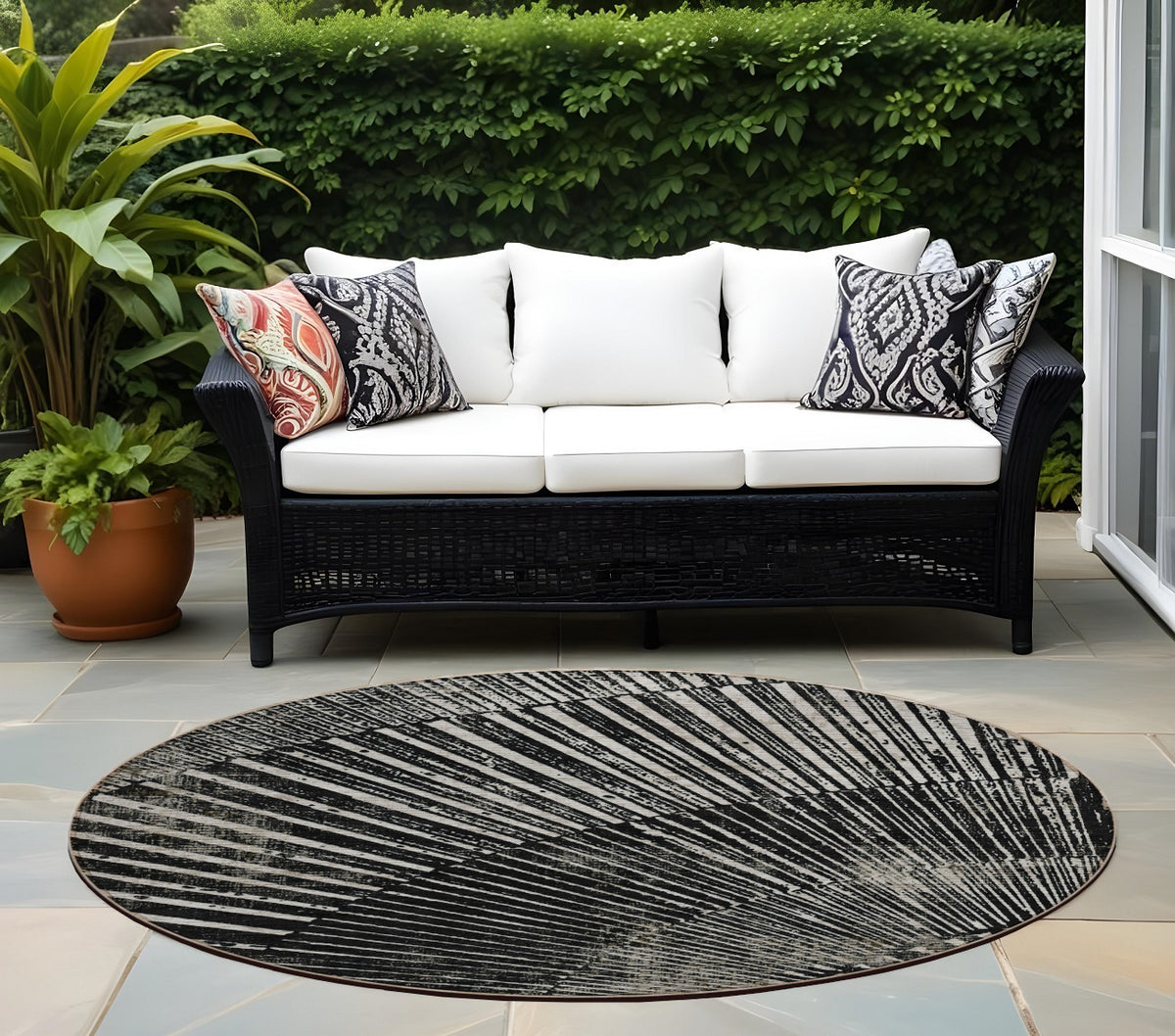 8' Round Black and Ivory Round Abstract Washable Non Skid Indoor Outdoor Area Rug