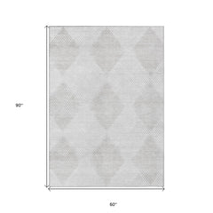 5' X 8' Ivory Geometric Washable Non Skid Indoor Outdoor Area Rug