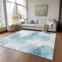 8' X 10' Teal and Ivory Abstract Washable Non Skid Indoor Outdoor Area Rug