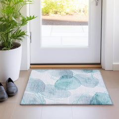 2' X 3' Teal and Ivory Abstract Washable Non Skid Indoor Outdoor Area Rug