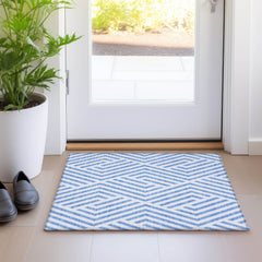 2' X 3' Blue and Ivory Geometric Washable Non Skid Indoor Outdoor Area Rug