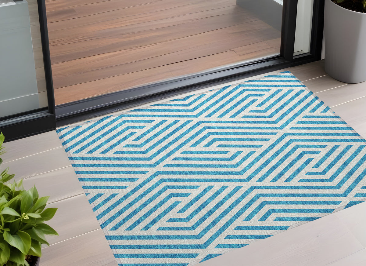 2' X 3' Teal and White Geometric Washable Non Skid Indoor Outdoor Area Rug