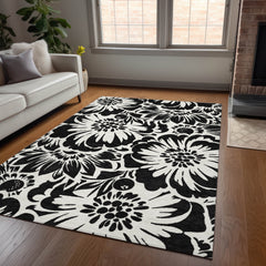 5' X 8' Black and Ivory Floral Washable Non Skid Indoor Outdoor Area Rug