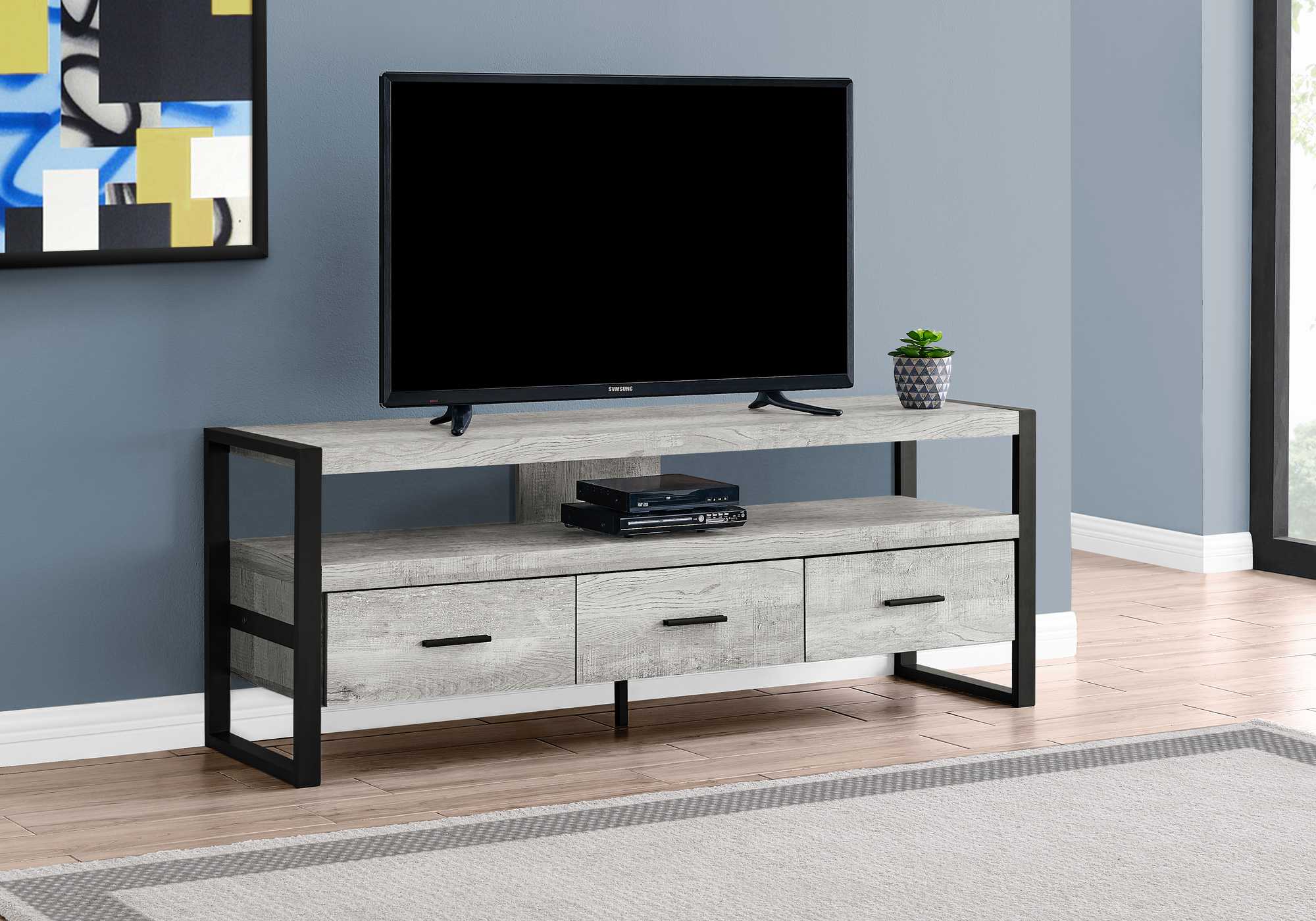 21.75" Grey Particle Board Hollow Core &amp; Black Metal TV Stand With 3 Drawers