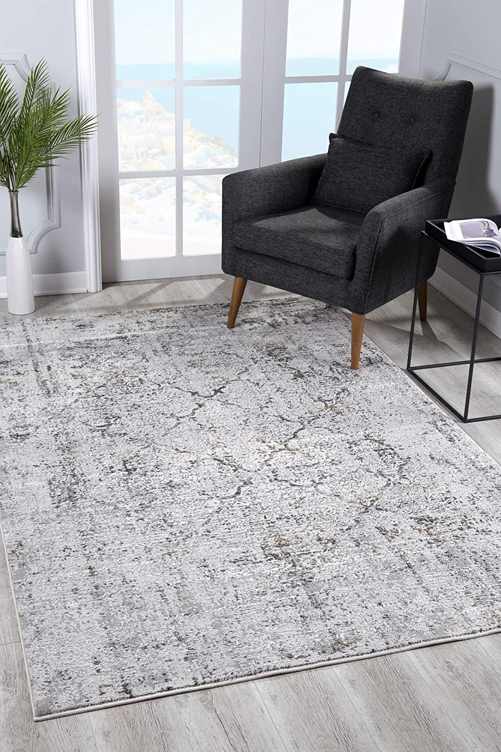 5' X 7' Gray And Ivory Abstract Dhurrie Area Rug