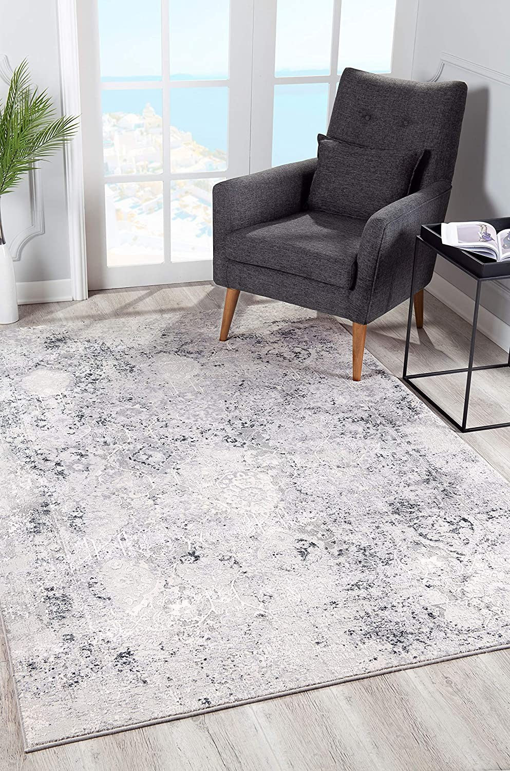 5' X 7' Gray And Ivory Abstract Dhurrie Area Rug