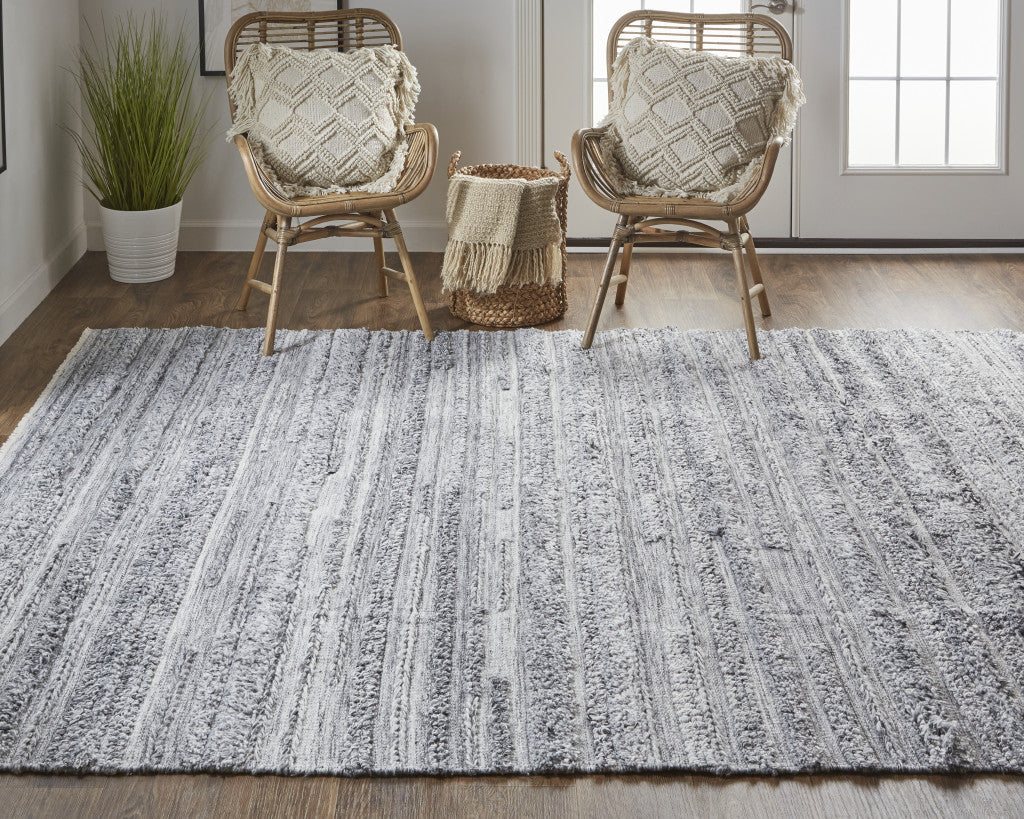 5' X 8' Gray And Ivory Striped Hand Woven Stain Resistant Area Rug